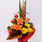 Celebration lilies, roses and gerberas.