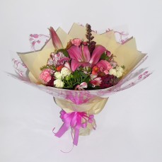 Bouquet in lush pink, deep purple and white tones.